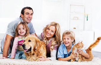 happy family with pet cat and dog